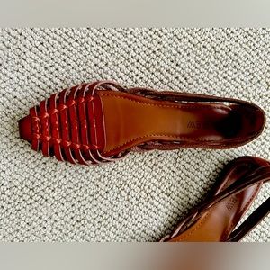 Gently worn huarache style shoe